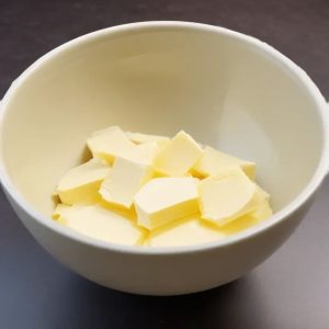 this image shows the process of beating butter with salt